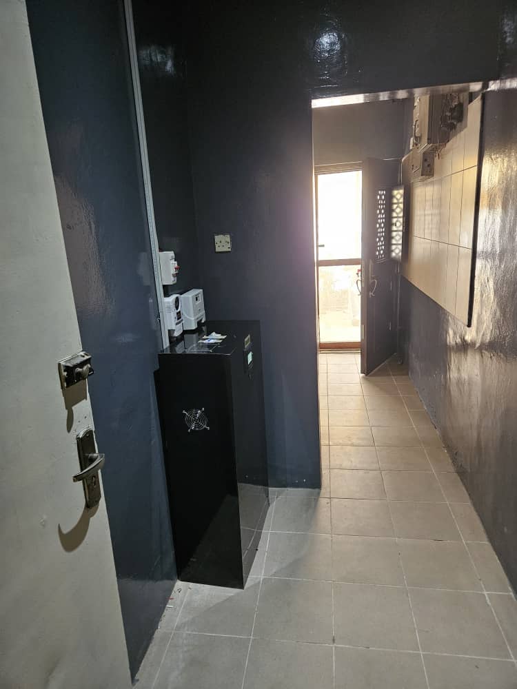 Bexolie branded floor battery storage with wall mounted protection