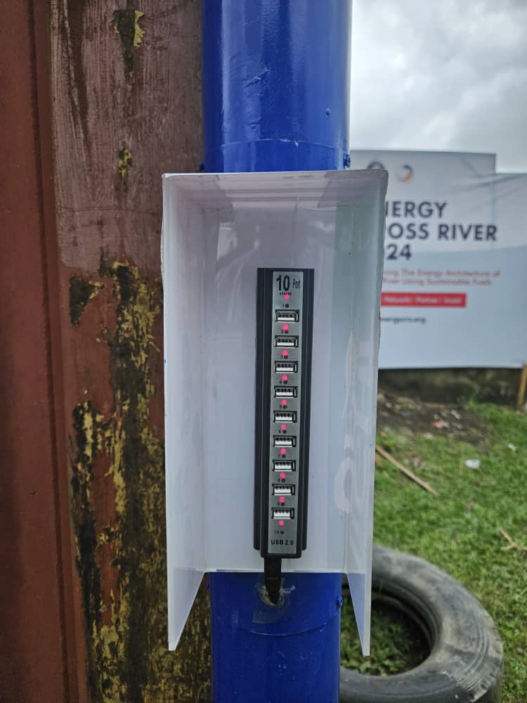 Ten port USB charging hub on solar powered community pole